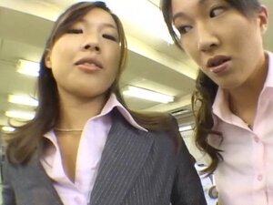 In the office a group of Japanese girls tit fuck a